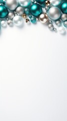 Modern Christmas background with teal and silver decoration on white backdrop. Space for text