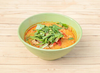Deliciously spicy coconut curry soup packed with fresh vegetables and herbs