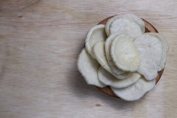 Fish crackers, Palembang crackers are a type of traditional Indonesian cracker originating from Palembang, Indonesia. Served on a wooden plate