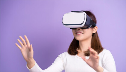 Smiling woman in VR glasses in purple background.