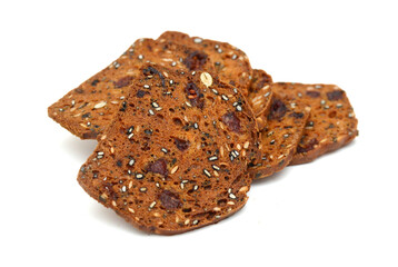 Slices of brown bread with nut on white background