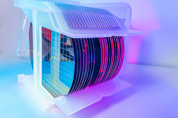 patterned silicon wafers in a universal pod. Electronic circuit designs have been built onto the...