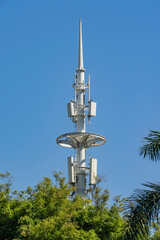 communication tower for 5G network telephone cellsite with dusk sky