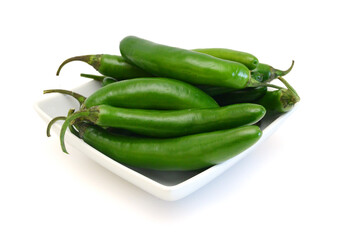 Green chilies (jalapeno) on white background