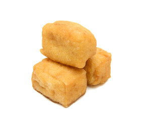 Fried tofu on a white background