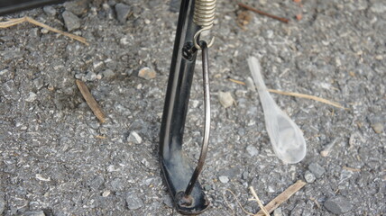 Close-up of a Metal Kickstand on a Motorcycle or Bicycle