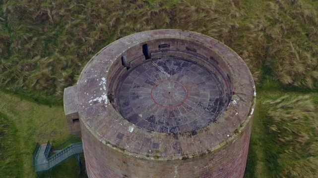Top-down aerial shot revealing Magilligan Martello Tower's stonework details,