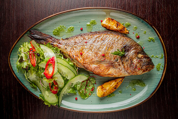 fried dorado with fresh salad