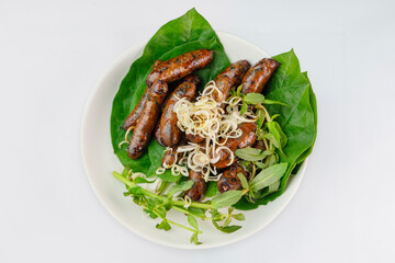 Tasty goat blood sausages. Grilled  goat blood sausages. Vietnam food. Doi de nuong. Ninh Binh food.