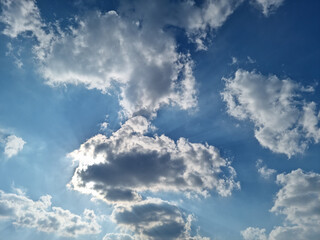 
Blue sky and white puffy clouds