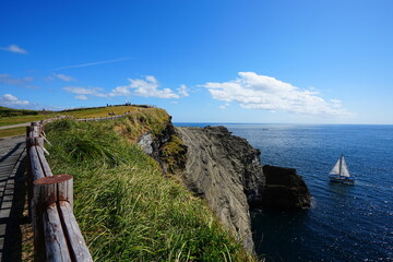 seaside cliff and fine yacht