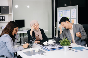 Furious businesspeople arguing strongly after making a mistake at work in office.