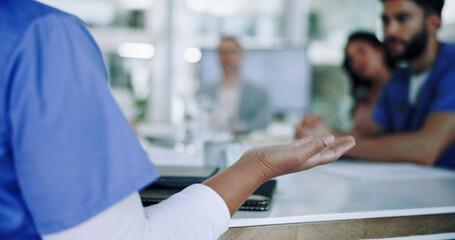 Doctor, hand and discussion with team in meeting for presentation, collaboration or proposal at...