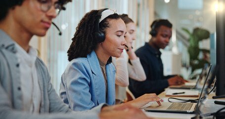 Woman, laptop and people in call center for customer support, telemarketing and lead generation. Agent, computer and consulting in coworking space for CRM, assistance and advice service at help desk