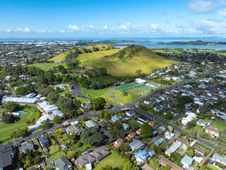 Aerial view of Mangere Mountain in the suburb of Mangere Bridge, Auckland, New Zealand