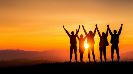 Fototapeta premium Silhouetted figures celebrate against a stunning sunset backdrop, evoking feelings of joy, unity, and natural beauty.