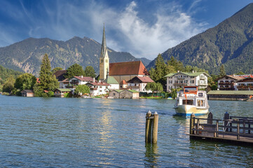 Fototapeta premium Tourist Boat at Jetty in Village of Rottach-Egern at Lake Tegern