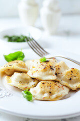Dumplings with potato and cottage cheese stuffing (pierogi). Traditional Polish Christmas Dinner....