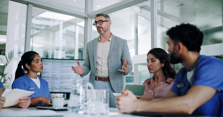 Man, medical team and meeting with presentation in conference for planning, proposal or discussion...