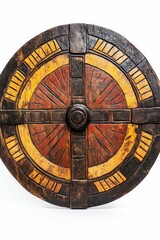 Ornate carved wooden shield with yellow and red accents.
