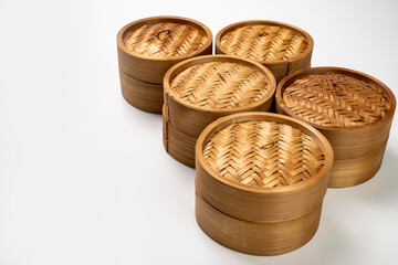 Set of chinese dim sum dumpling bamboo bowl basket isolated over white background