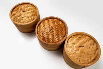 Set of chinese dim sum dumpling bamboo bowl basket isolated over white background