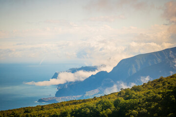 Viewpoint at Parque Florestal do Fanal on Madeira, Portugal, with rolling mountains and clouds