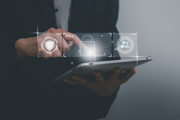 Cyber security and futuristic technology concept businessman using digital identity pernal interface,to scan password,with technology icons and padlock,with artificial intelligence system or ai.