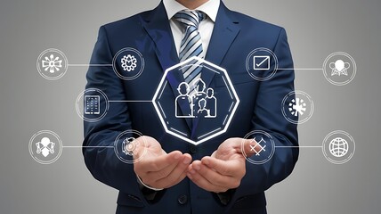 Strategic Human Capital Management: A businessman in a dark suit presents a digital holographic icon representing team collaboration, symbolizing the strategic management of human resources.