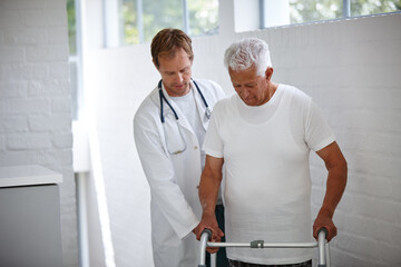 Elderly man, doctor and helping with walker at house of medical support, healthcare and treatment. Therapist, mobility and patient with disability for exercise, physical therapy and rehabilitation