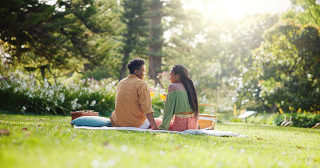 Back, relax and love with black couple and picnic for bonding, happiness and romantic date. Calm,...