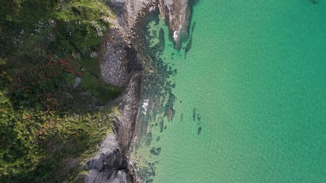 Drone footage of the rocks formation and coastal cliffs on the shore of Biscay province, Spain