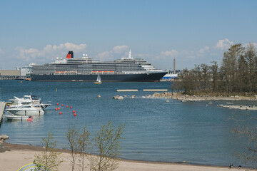 Luxury classic ocean liner cruiseship cruise ship Victoria in port of Helsinki, Finland with city...