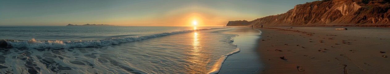 Fototapeta premium Golden Sunset Over a Tranquil Beach