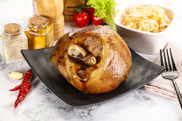 Baked pork knee with spices