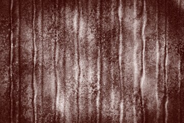 A background with a rough texture and lines in brown tones. There is a vertical gradient of dark and light brown. Gives the feeling of the ground or surface being eroded from nature.
