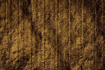 dark gold background Mixed with fine black lines throughout the image. This creates a pattern that looks like the surface of wood or thick fabric. It resembles a rough and deep natural surface.
