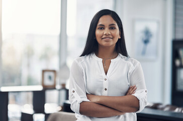 Portrait, business and creative woman with arms folded in office for career, job opportunity and...