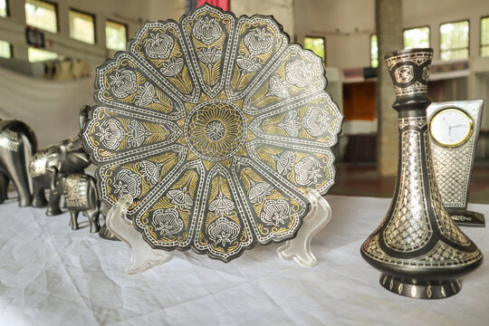 A Fruit Plate made up of Copper-Zinc metal and inlaid with Silver and Gold known as 'Bidriware' art by the artisans in Bidar town in Karnataka, India.