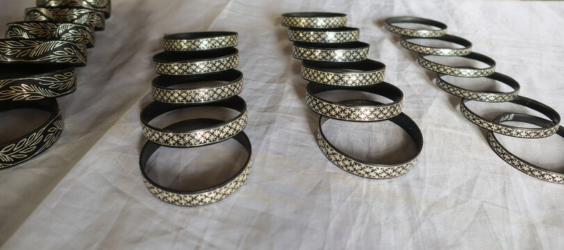 A Collection of Bangles made up of Copper-Zinc metal and inlaid with Silver known as 'Bidriware' art in Bidar town in India.