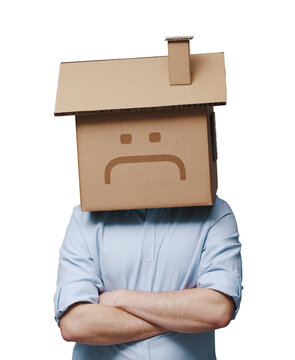 Sad man with cardboard house in place of his head