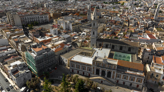 Aerial view of the church of San Francesco, with its high bell tower, and the city hall of Andria, in Puglia, Italy