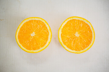 Smooth, circular lemon slices in orange-yellow color are perfect for making drinks
