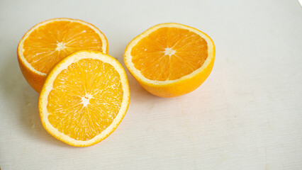 Smooth, circular lemon slices in orange-yellow color are perfect for making drinks