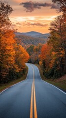 Fototapeta premium Serene sunset view of winding road through lush green hills for travel photography