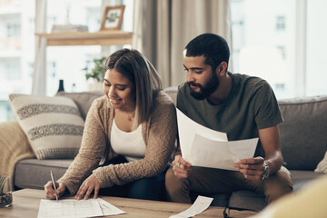 Home, couple and smile with signing documents for mortgage or loan agreement on sofa. Apartment,...