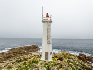 Faro y praia do Lago en Muxia Galicia