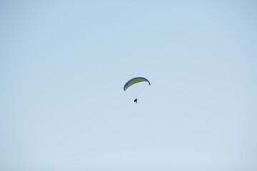 paragliding in the blue sky