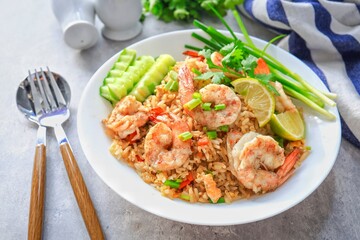 Fototapeta premium Fried rice with shrimps on a white plate, 