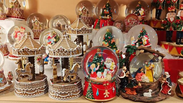 Carillon and snowglobe for sale at the famous tyrolean christmas market of Arezzo in Tuscany